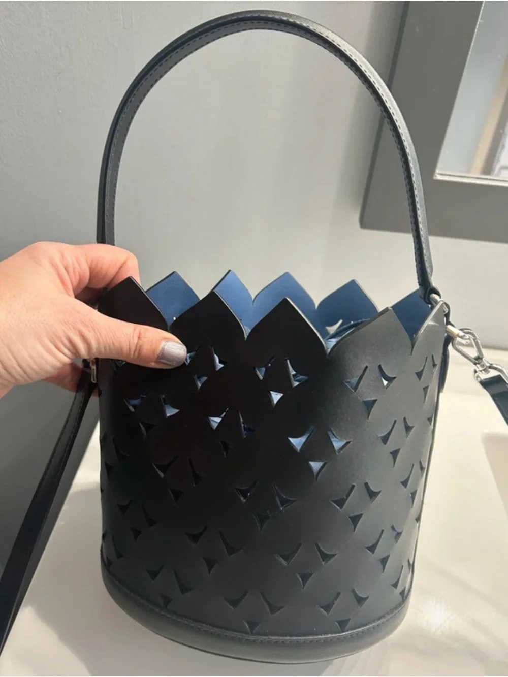 Kate Spade Black Leather Laser-Cut Bucket Bag like new only used one time.